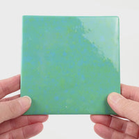 Video showing Morasutti Smalti mosaic tile – green_blue – 11.5 x 11.5 cm, rotated to show full tile